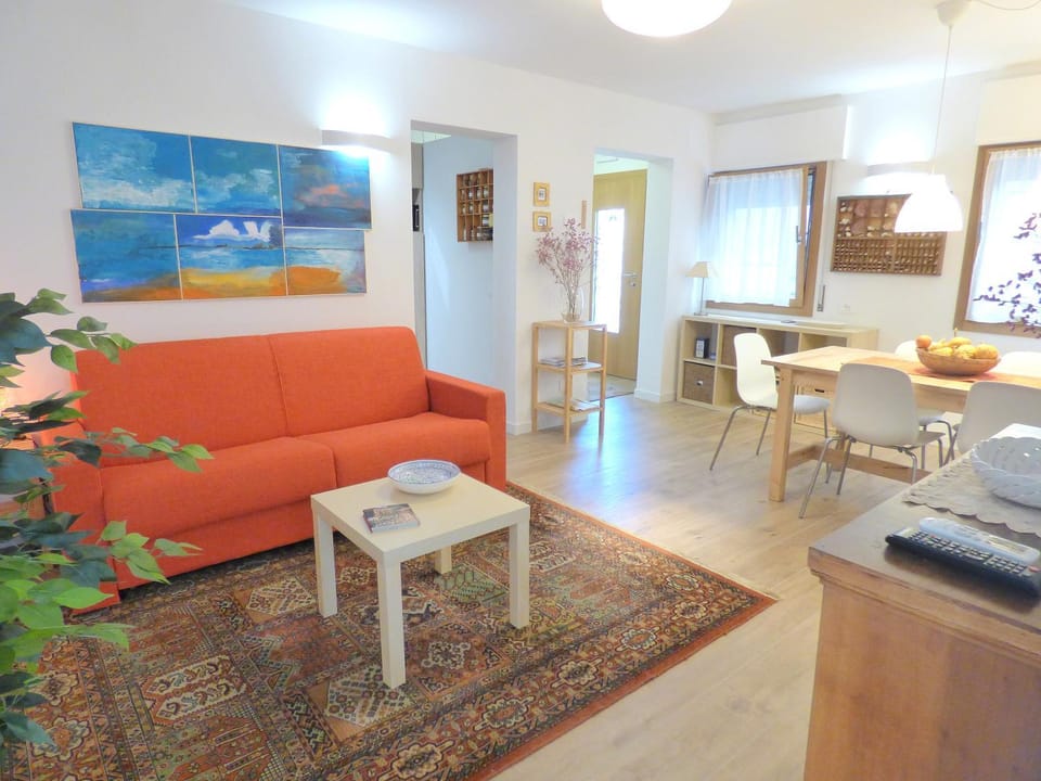Bed, Living room, Seating area, Dining area
