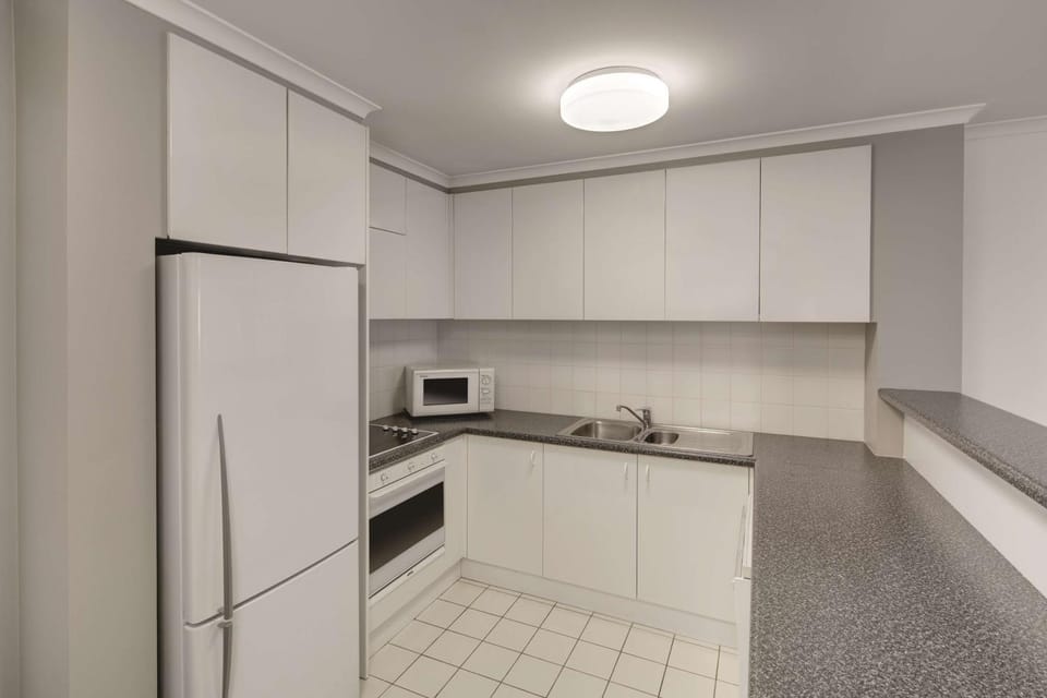 Kitchen or kitchenette, stove