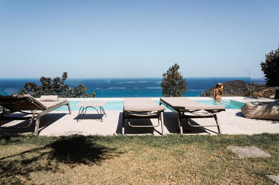 Day, Natural landscape, Seating area, Beach, Sea view, Swimming pool, sunbed