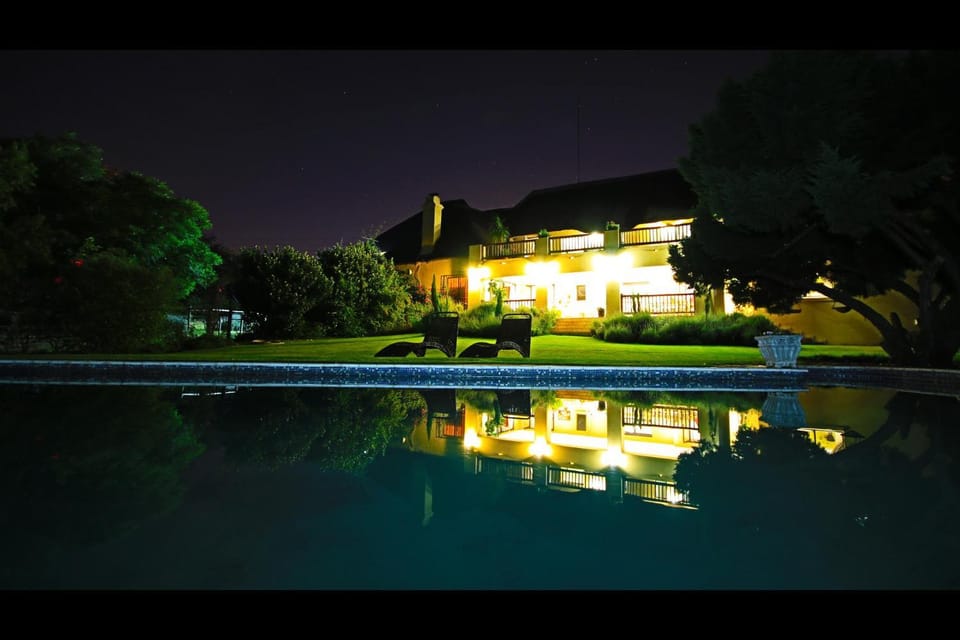Property building, Night, Natural landscape, Garden, Swimming pool