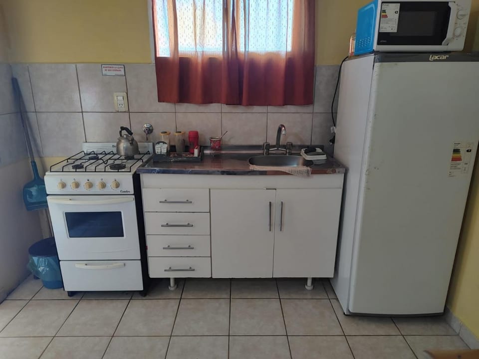 Kitchen or kitchenette, oven, stove