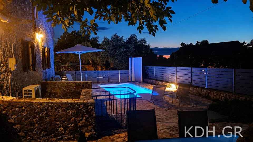 Property building, Night, Pool view, Swimming pool, sunbed