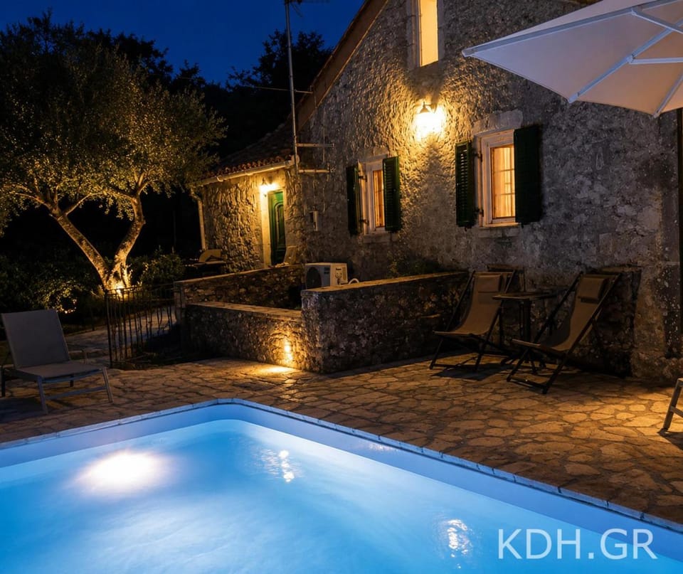 Property building, Patio, Night, Pool view, Swimming pool, sunbed