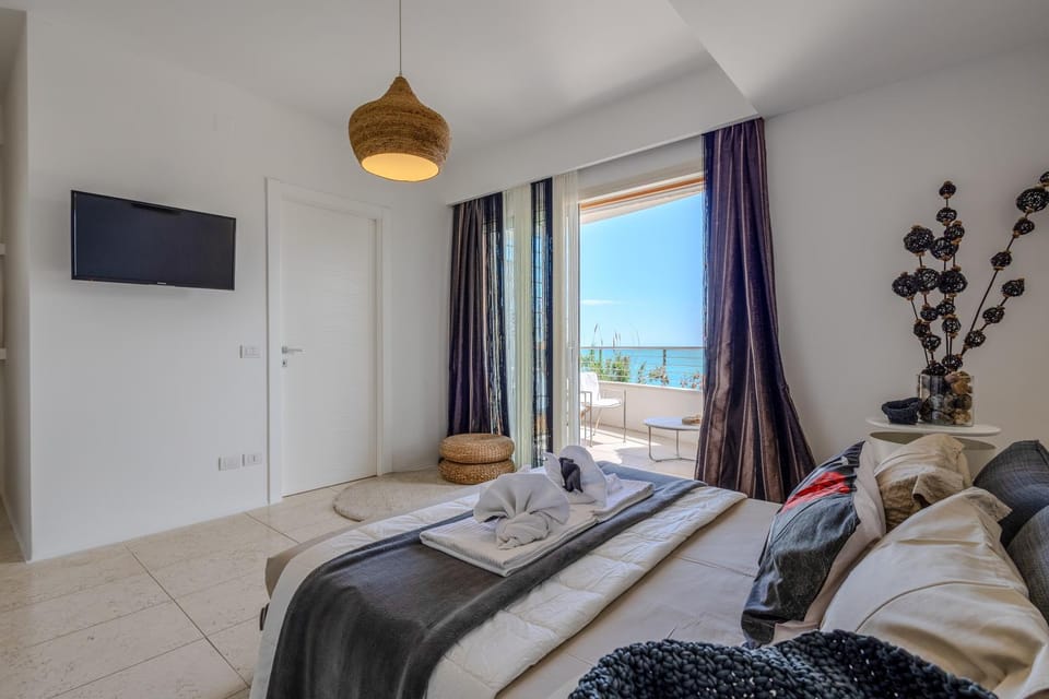 Photo of the whole room, Bedroom, Sea view, towels