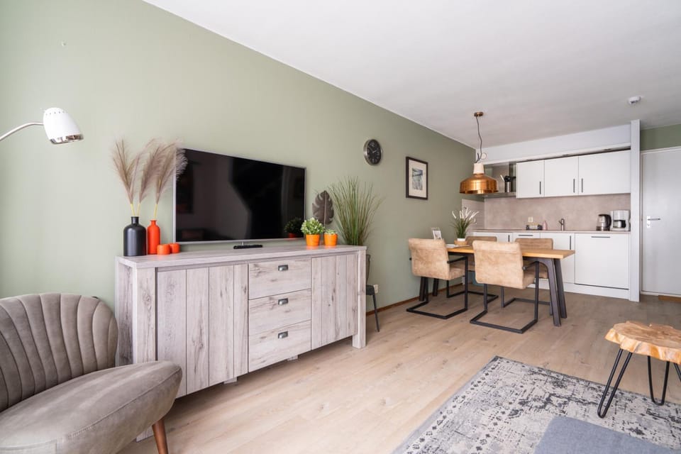 Photo of the whole room, dishwasher, stove, kitchen