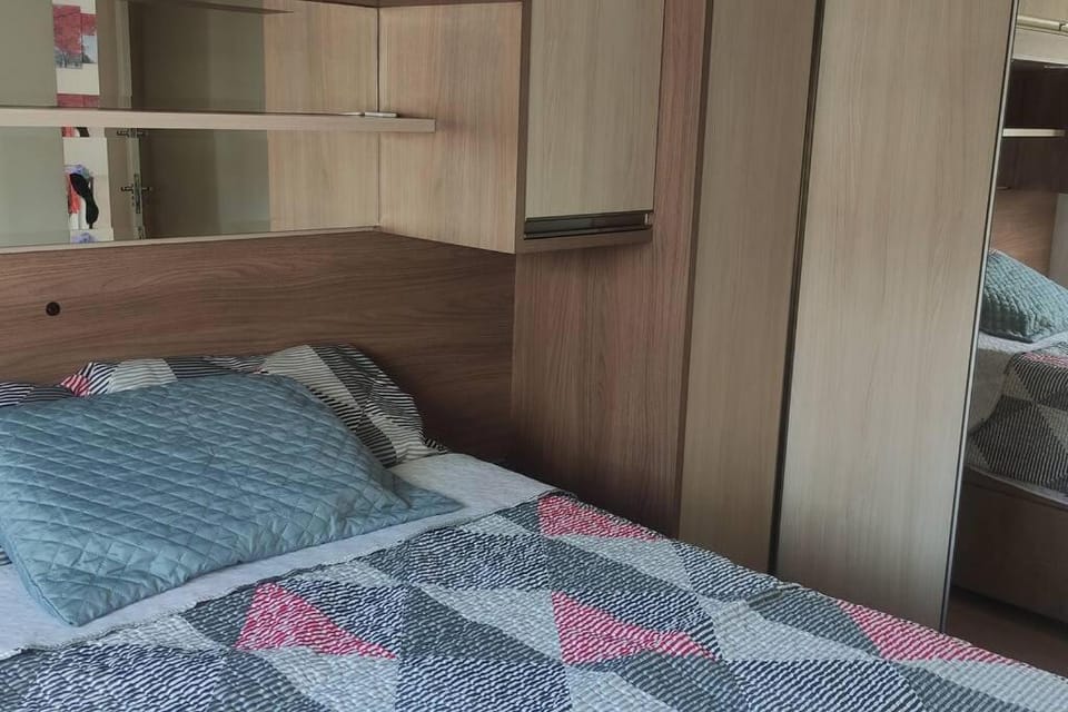 Apto completo em condomínio clube com 2 vagas de garagem I Lazer para toda família Apartment in Curitiba