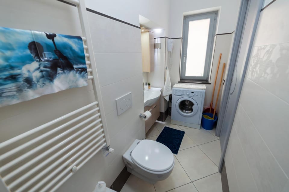 Toilet, Bathroom, heating, towels, washing machine