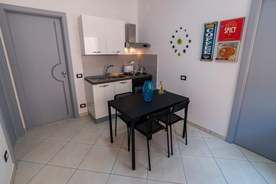 Kitchen or kitchenette, Photo of the whole room, Dining area, stove, kitchen
