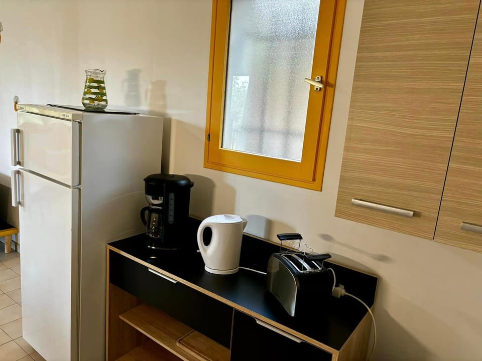 Kitchen or kitchenette, toaster