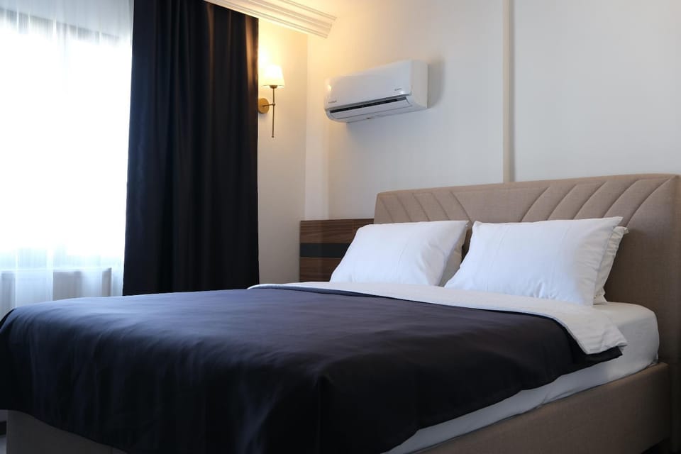 Bed, air conditioner