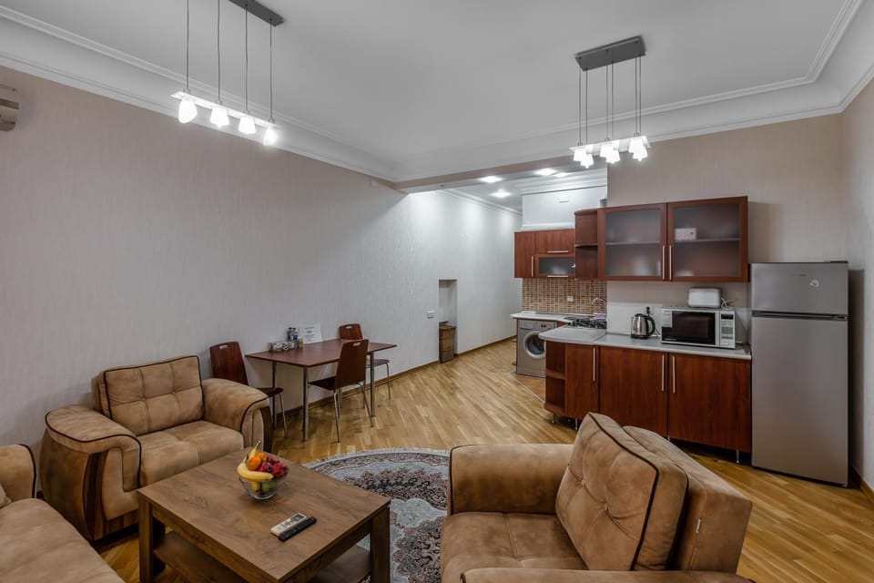 Kitchen or kitchenette, Living room, Seating area, oven, stove