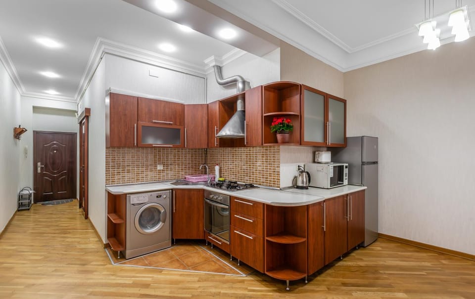 Kitchen or kitchenette, stove, washing machine