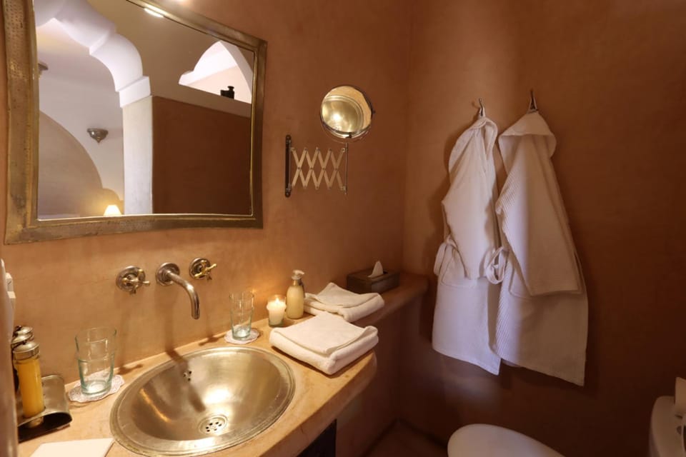 Shower, Toilet, Bathroom, hair dryier, towels