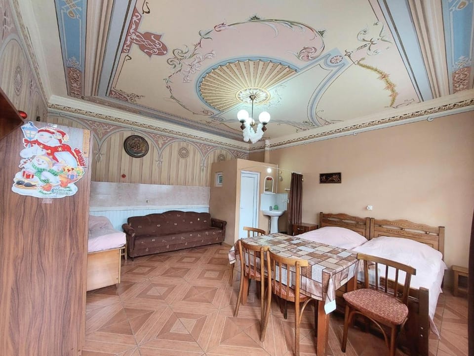 Bed, Dining area, wardrobe