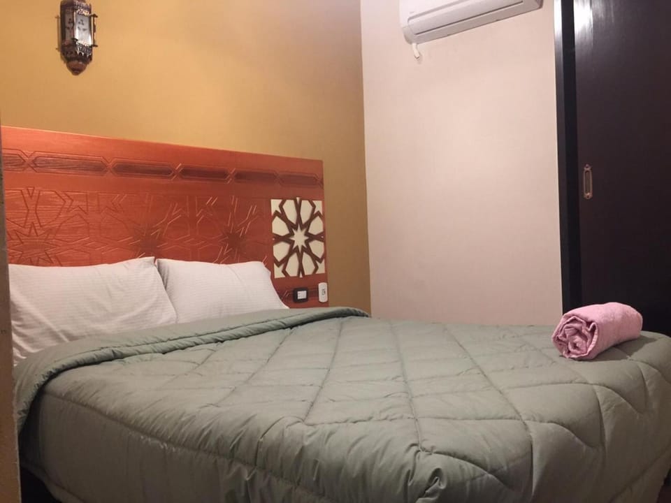 Bed, Bedroom, towels, air conditioner