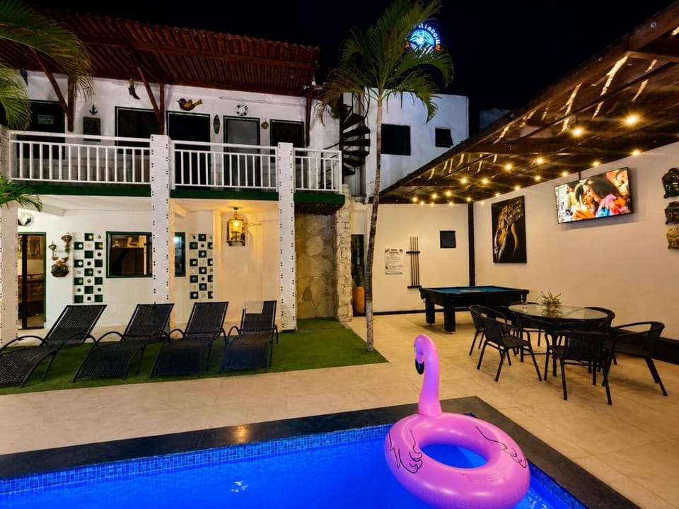 Communal lounge/ TV room, Night, Evening entertainment, Pool view, Swimming pool