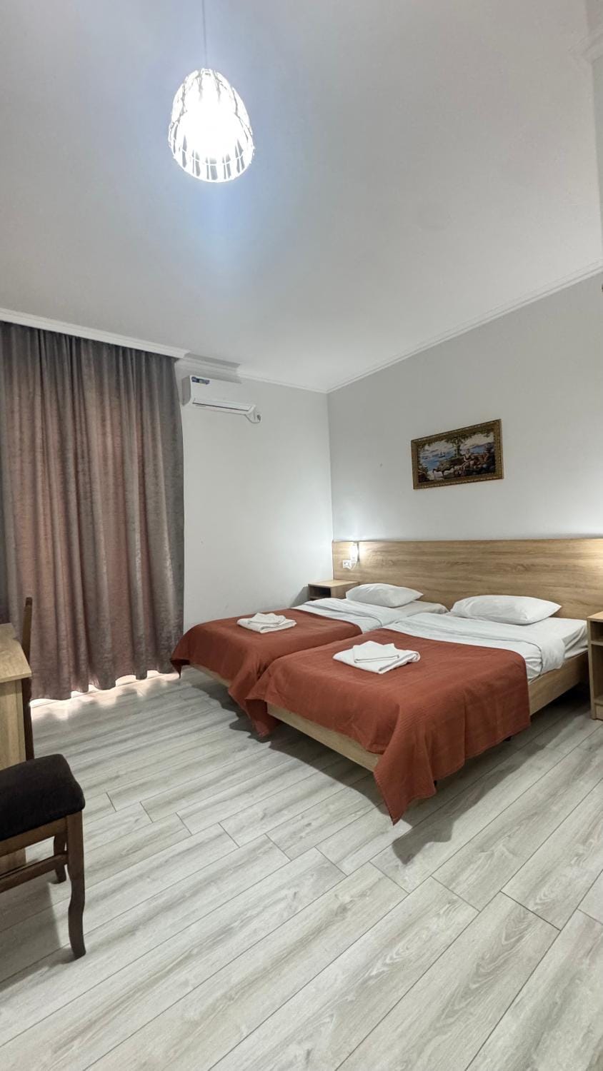 Bed, Photo of the whole room, Bedroom, towels, air conditioner