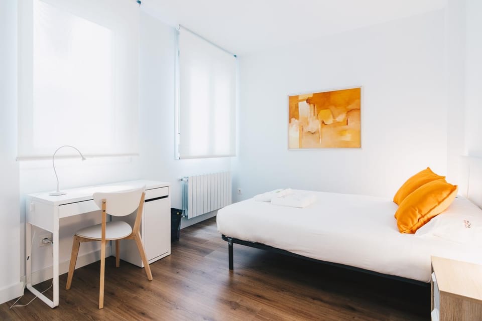 Bed, Seating area, Bedroom