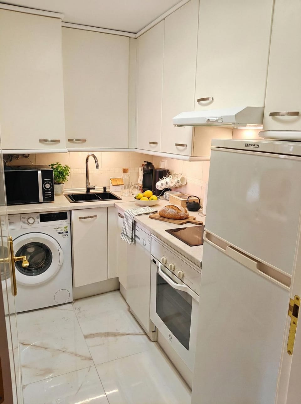 Kitchen or kitchenette, dishwasher, washing machine