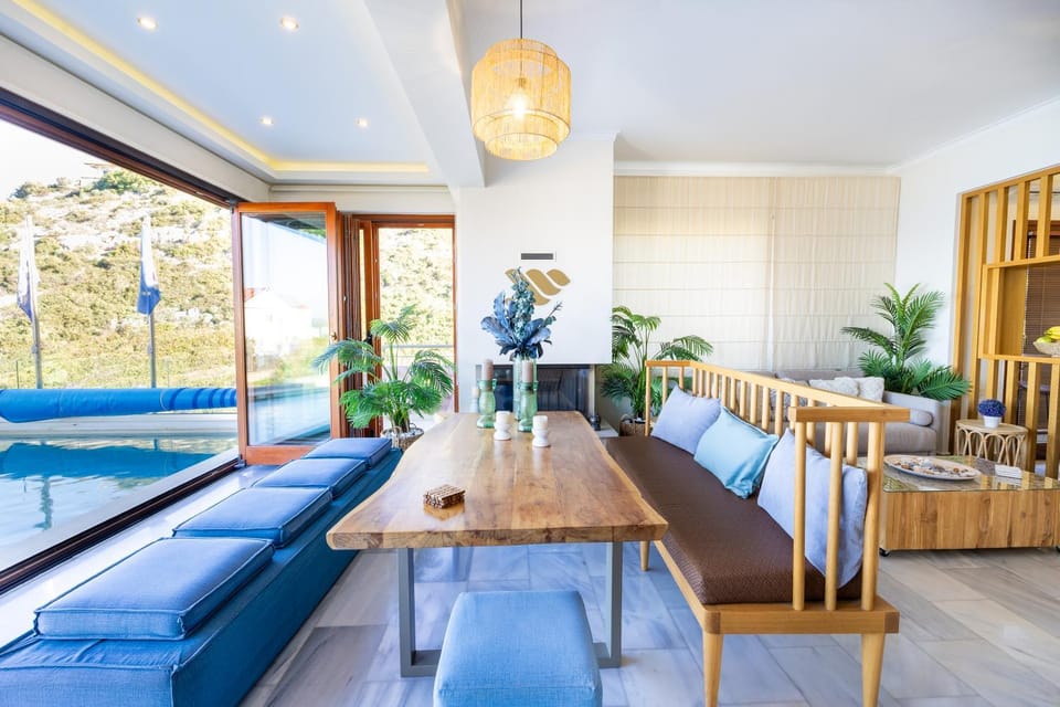 Living room, Seating area, Pool view
