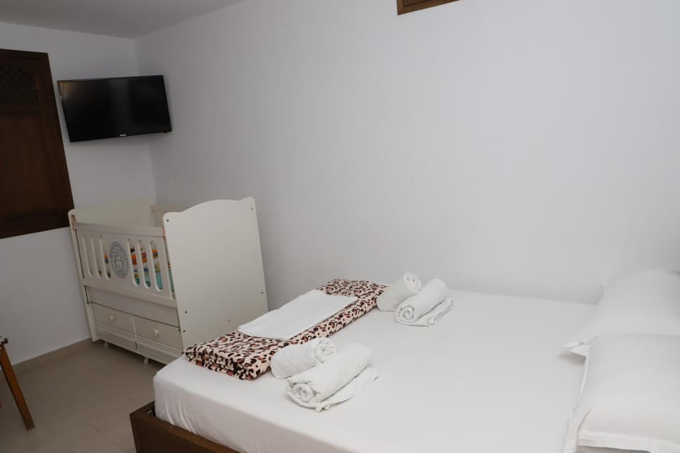 Bed, Photo of the whole room, Bedroom, cot, towels