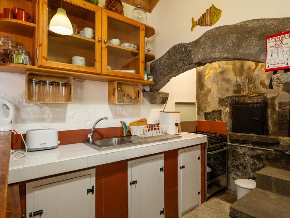 Kitchen or kitchenette, stove