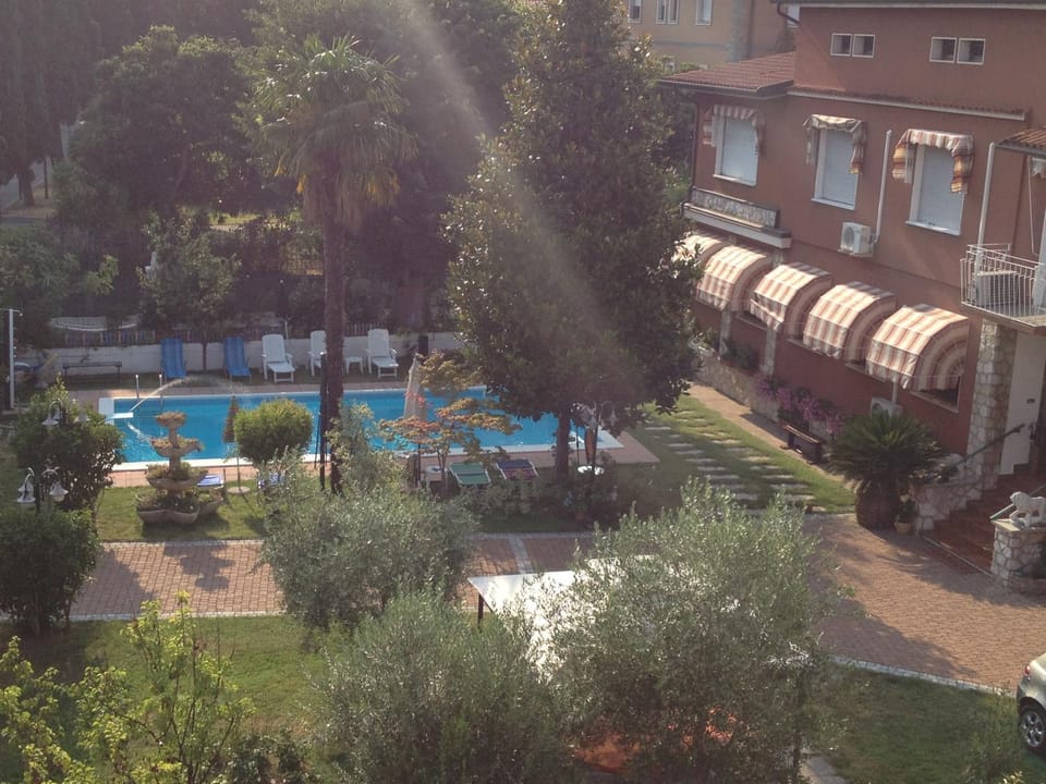 Property building, Facade/entrance, Garden, Garden view, Pool view