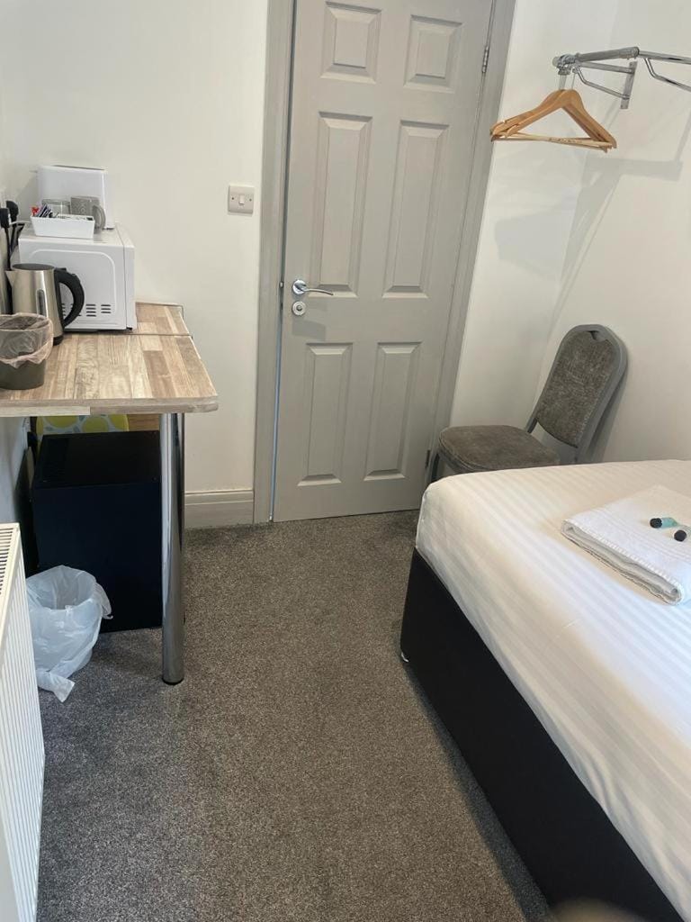 Bed, Kitchen or kitchenette, Bedroom, towels