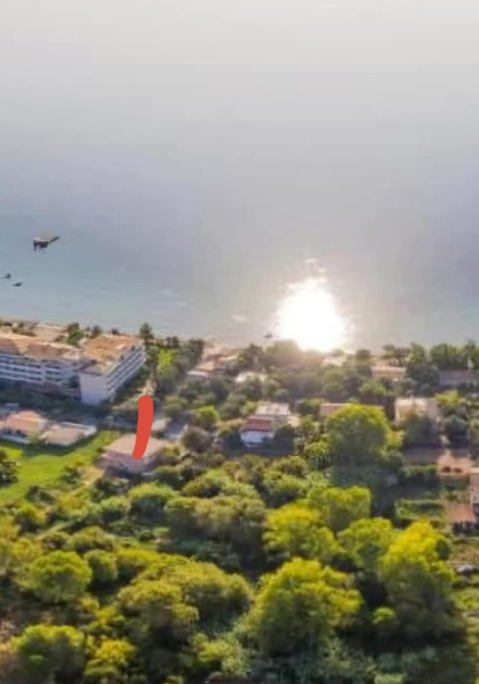 Property building, Day, Bird's eye view, Text overlay, Sea view