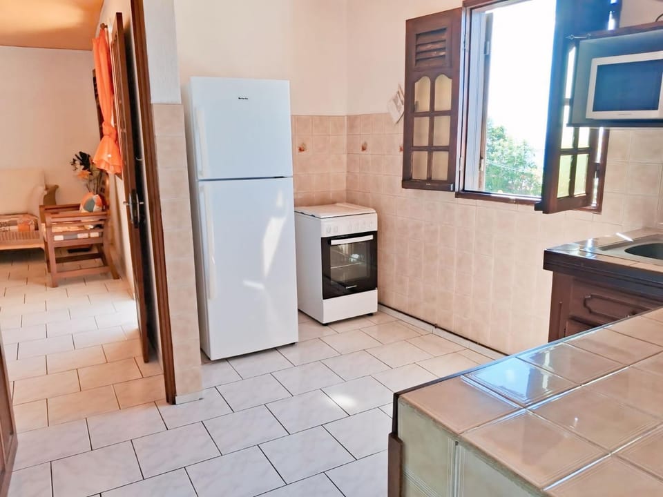 Kitchen or kitchenette, stove, kitchen