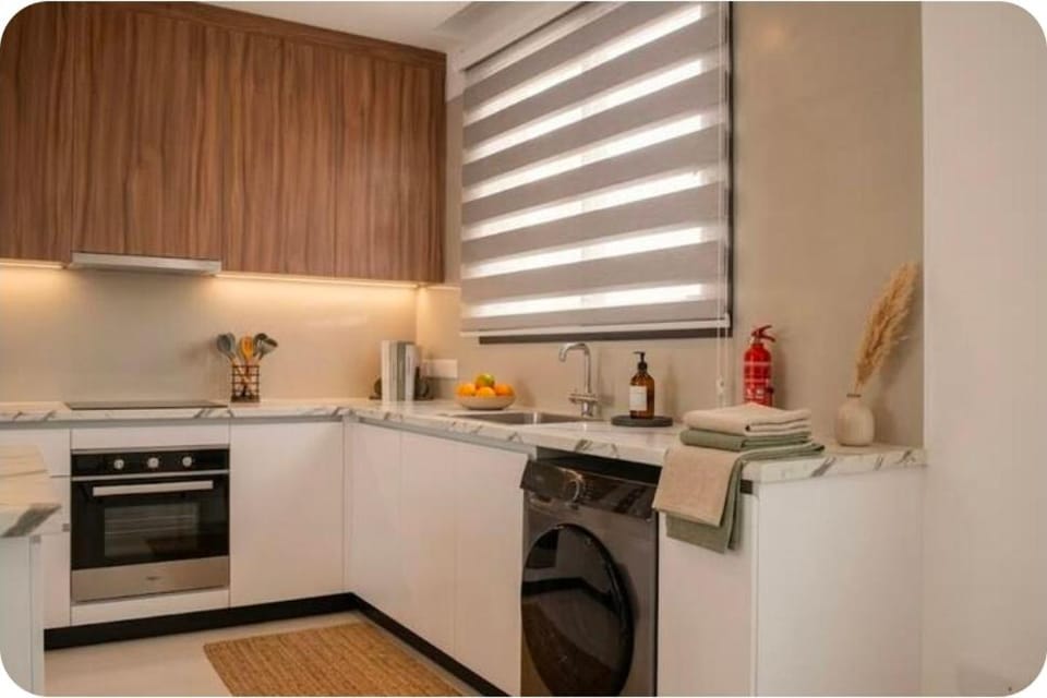 Kitchen or kitchenette, dishwasher, oven, stove, toaster