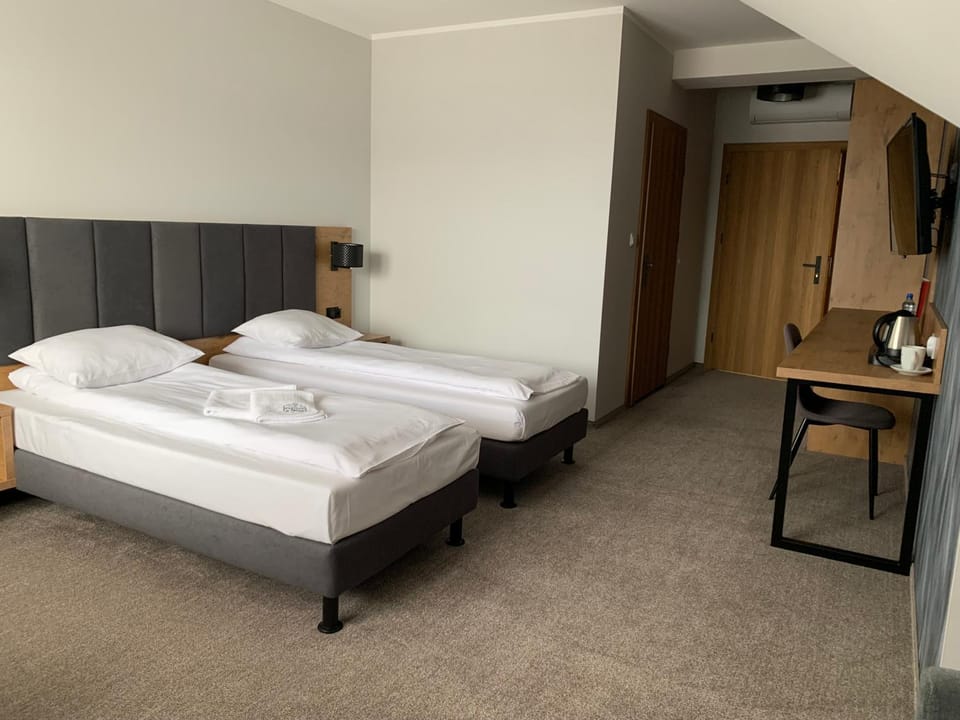 Bed, Photo of the whole room, hair dresser, towels
