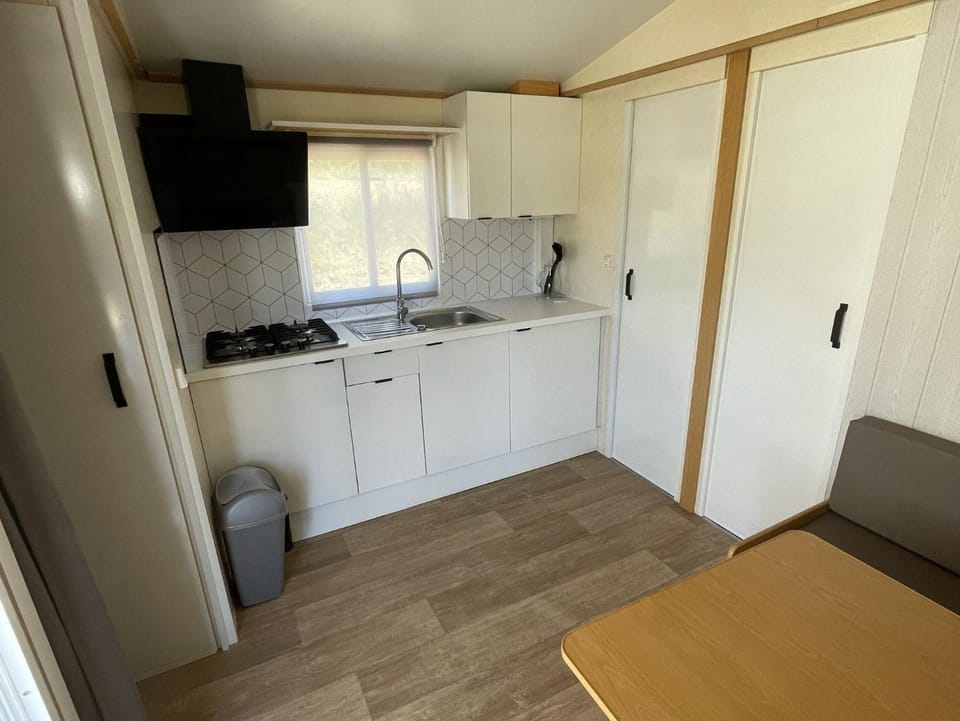 Kitchen or kitchenette, stove
