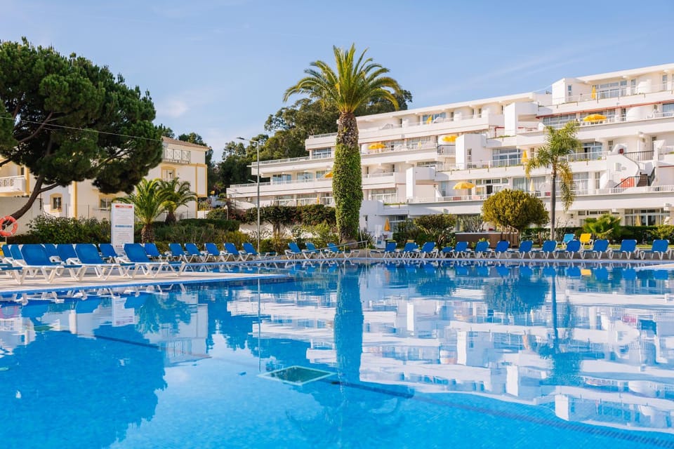 Property building, Pool view, Swimming pool, sunbed