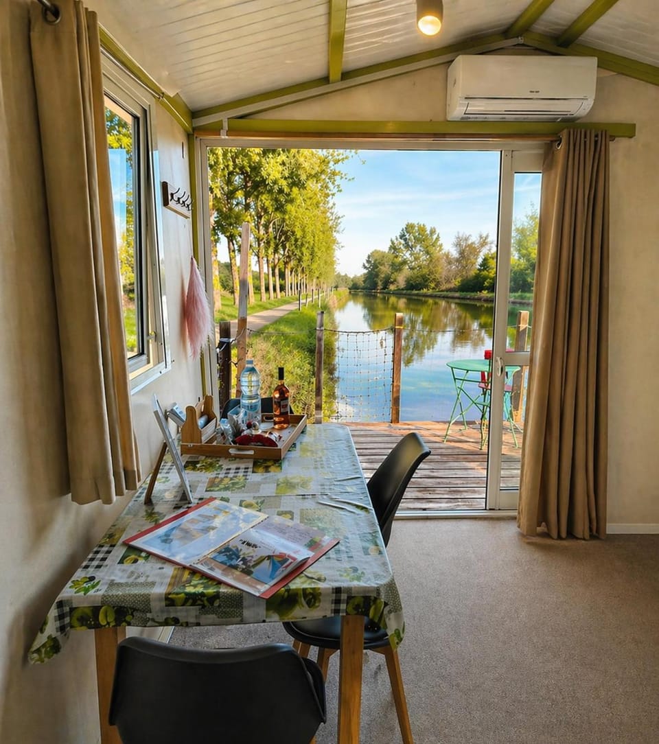Patio, Fishing, View (from property/room), Living room, Seating area, River view, furniture