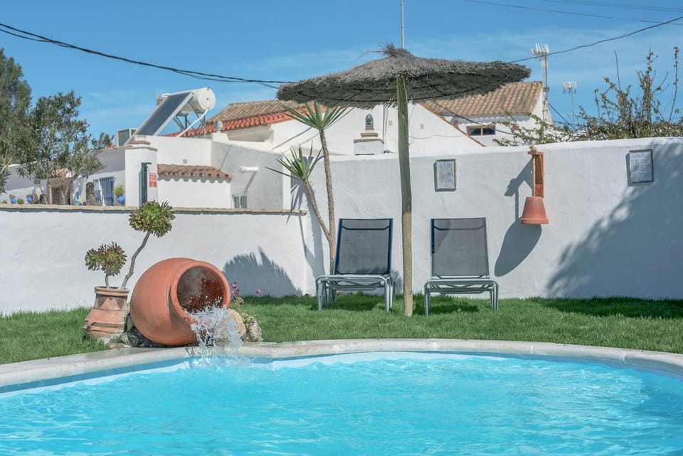 Property building, Living room, Swimming pool