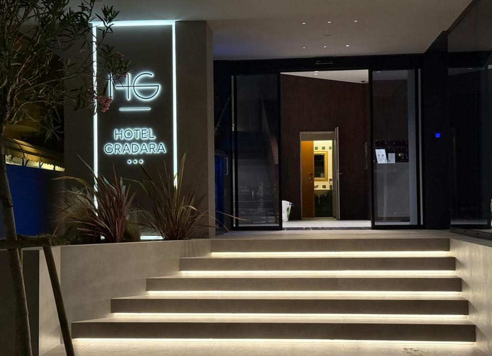 Facade/entrance, Night, Text overlay