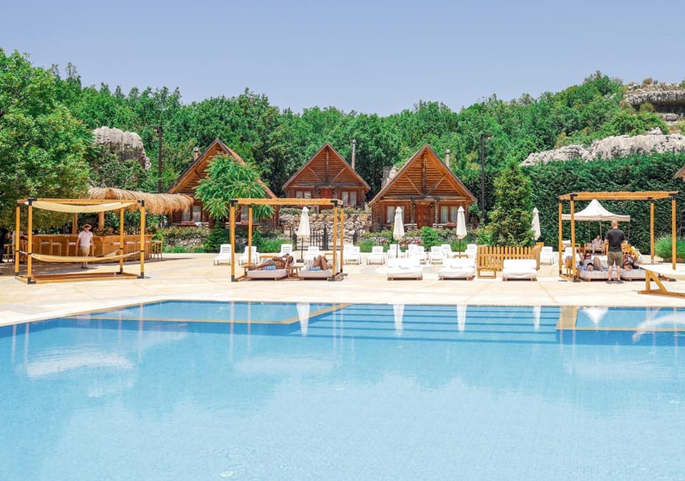 Property building, Day, Natural landscape, Lounge or bar, Pool view, Swimming pool, sunbed