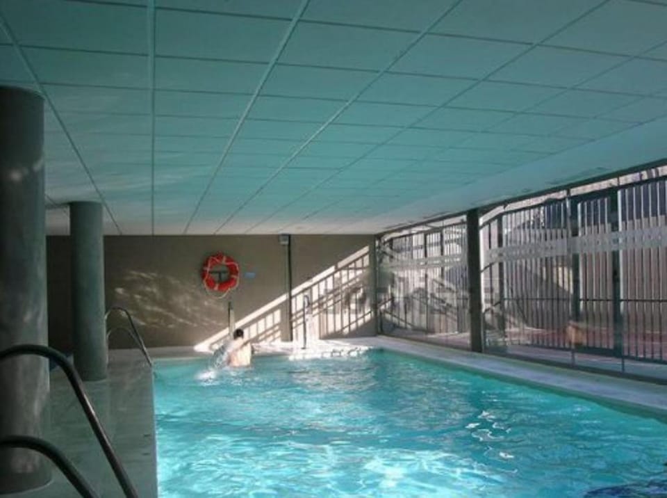 Apartamento Lujo, Primera linea playa, Garaje, Wifi, Piscina climatizada Apartment in Roquetas de Mar