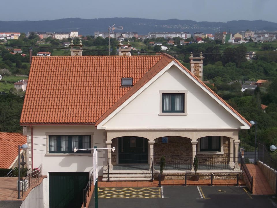 Property building, Facade/entrance, Natural landscape, City view, Mountain view