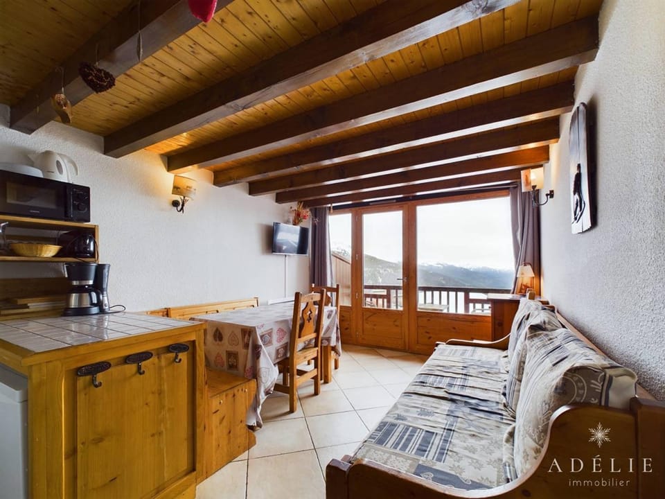 Appartement 6/7 pers. au pied des pistes, proche commerces, balcon sud, parking inclus Apartment in Montvalezan