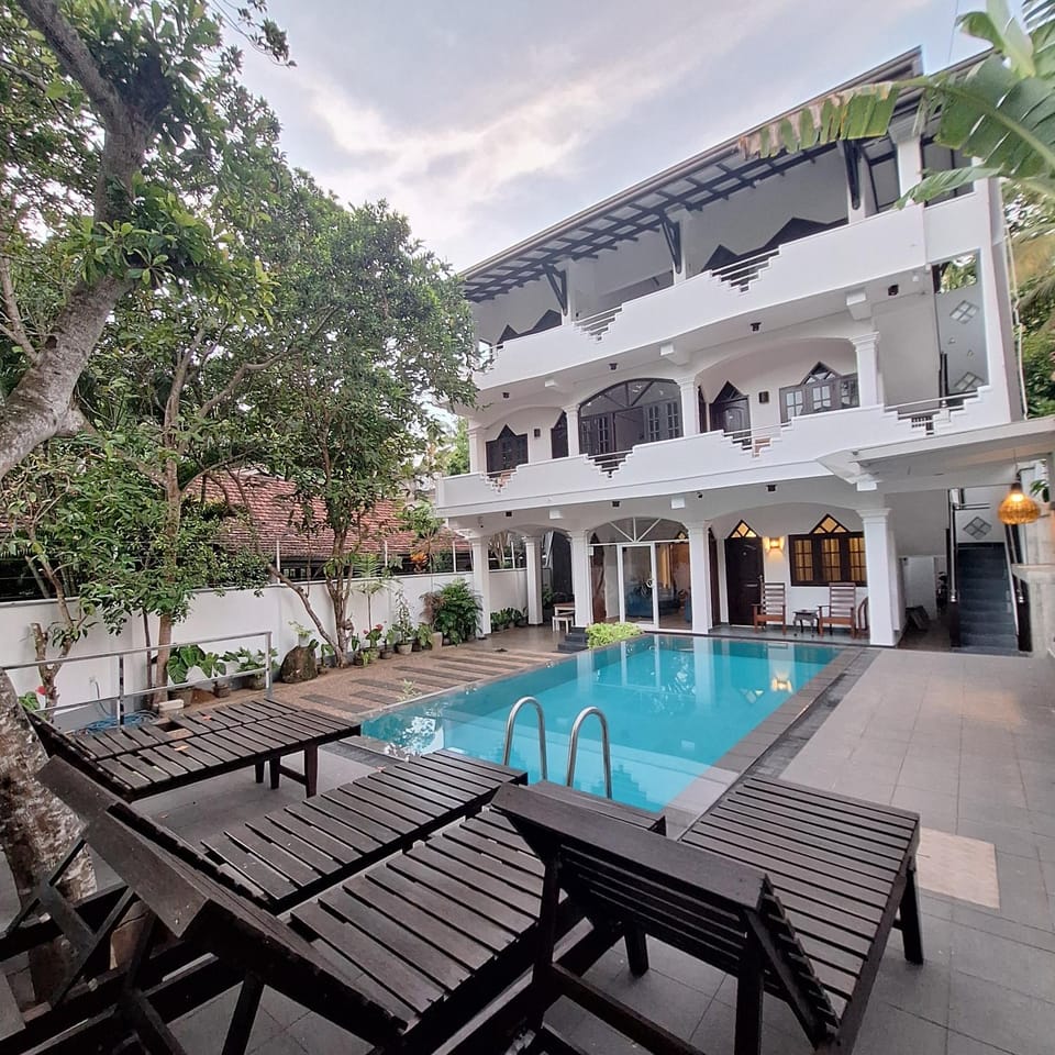 Property building, Patio, Day, View (from property/room), Pool view, Swimming pool, sunbed