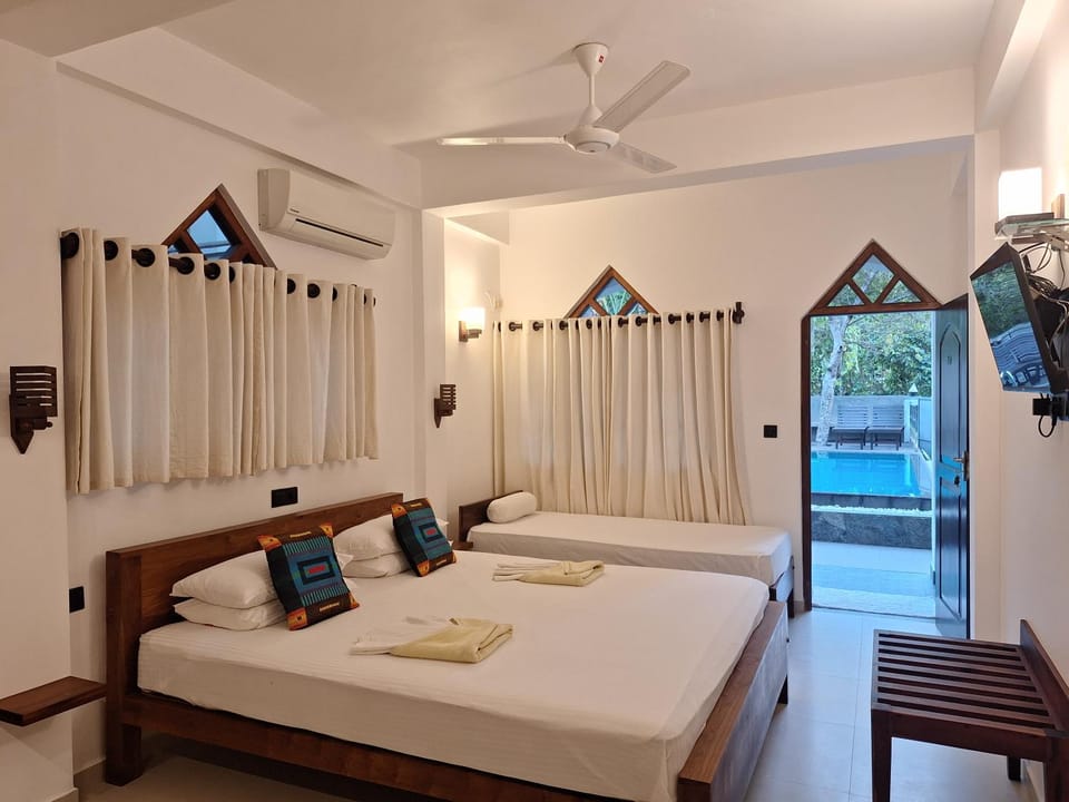 Bed, Photo of the whole room, Bedroom, towels, air conditioner