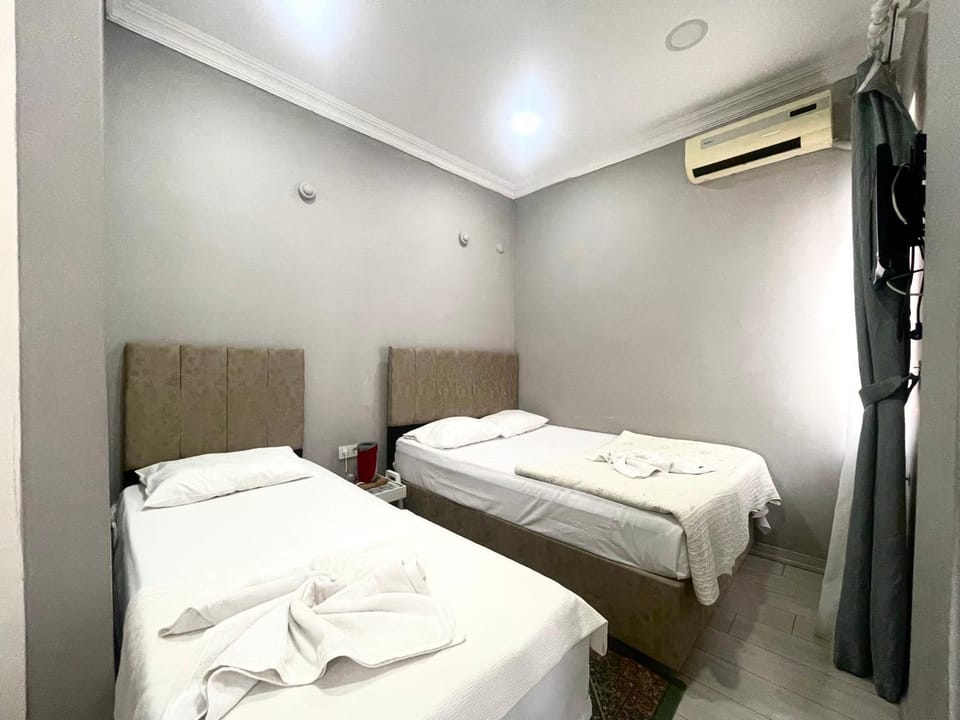 Bed, Photo of the whole room, Bedroom, towels, air conditioner