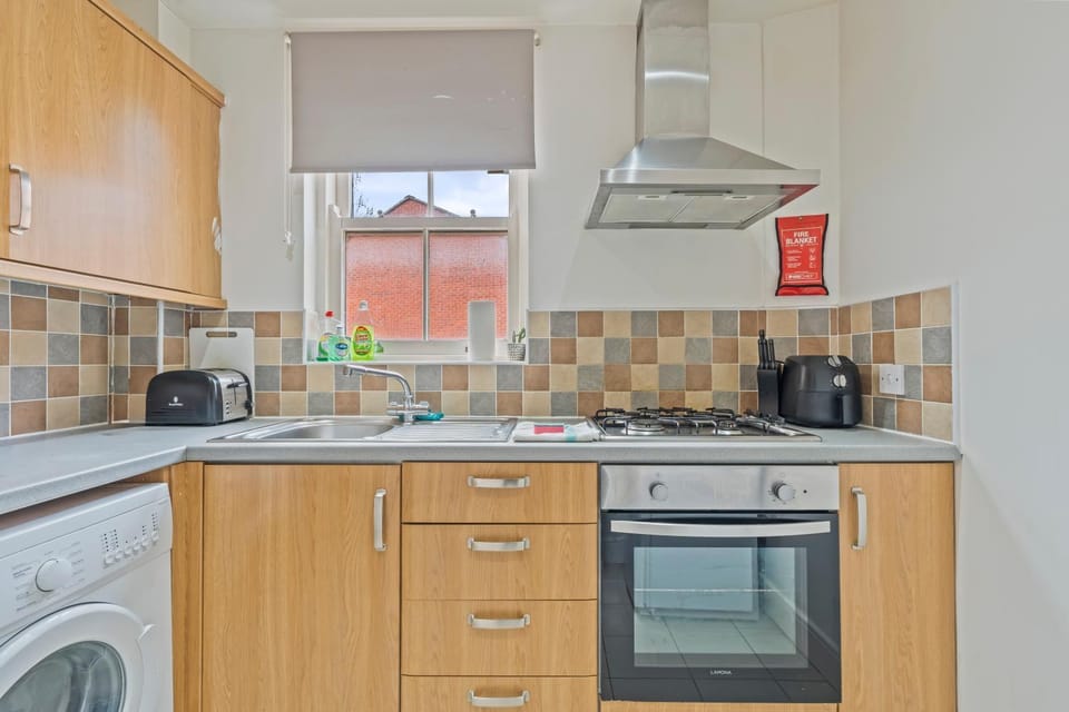 Kitchen or kitchenette, oven, stove