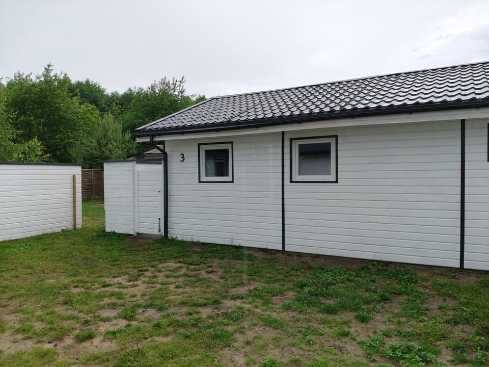 Radosna Zatoka - DOMKI Z OGRODZENIEM Campground/ 
RV Resort in West Pomeranian Voivodeship, Poland