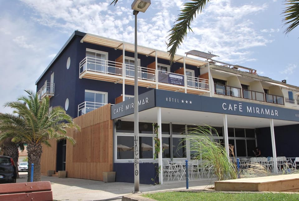 Property building, Facade/entrance, Day, Property logo or sign