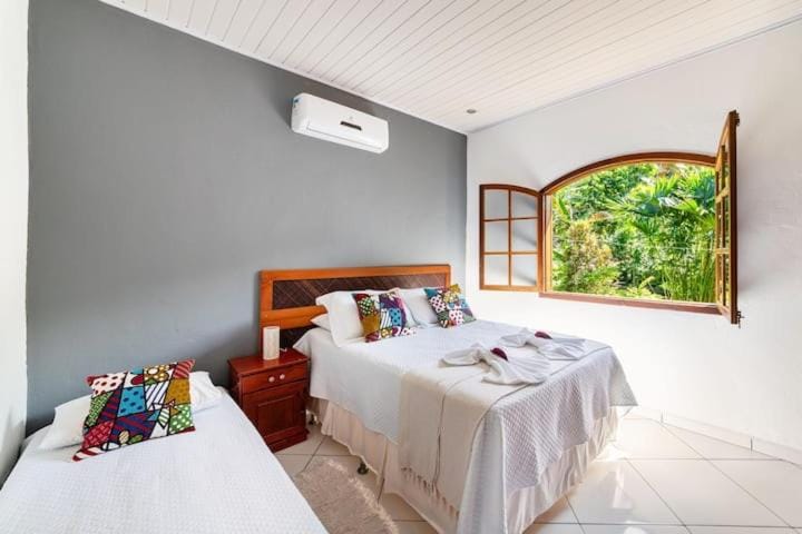 Recanto da Margo 1, casa com acesso a cachoeira House in Paraty