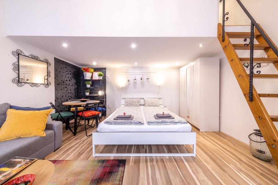 Bed, Seating area, wardrobe