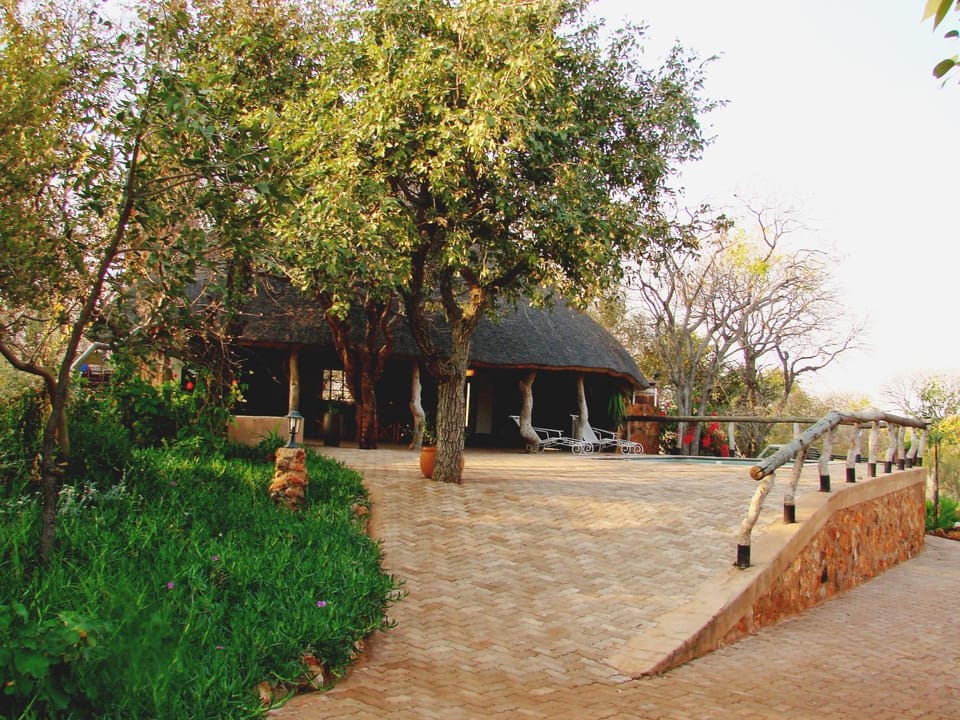 Facade/entrance, Children play ground, Garden, Lounge or bar, Evening entertainment, Pool view, Swimming pool, Alcoholic drinks, Non alcoholic drinks, group of guests, Family